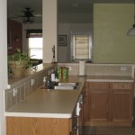 Kitchen looks out to living room, formal dining, and breakfast area